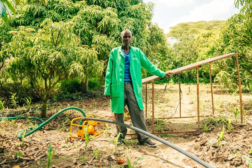 A man with a solar-powered water pump