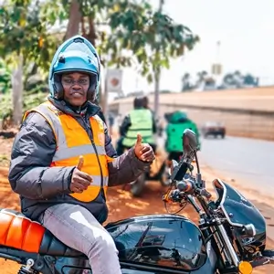 Benjamin Omukanda on a boda boda