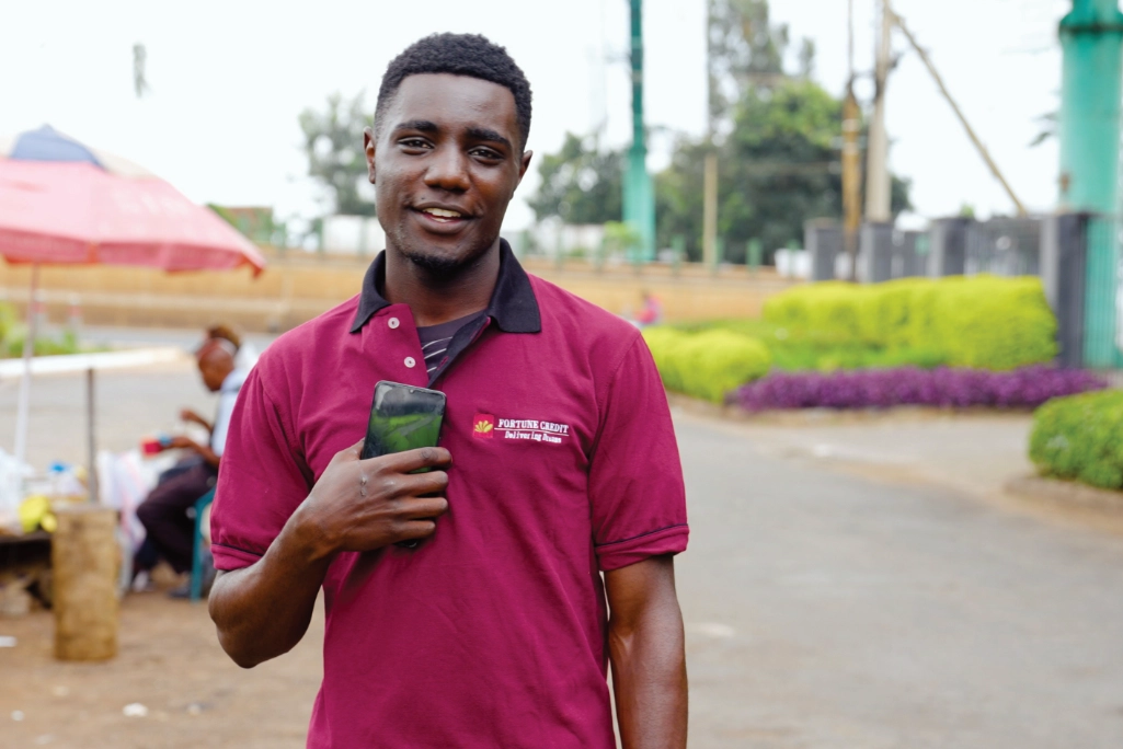 Mike Ingosi with a mobile phone
