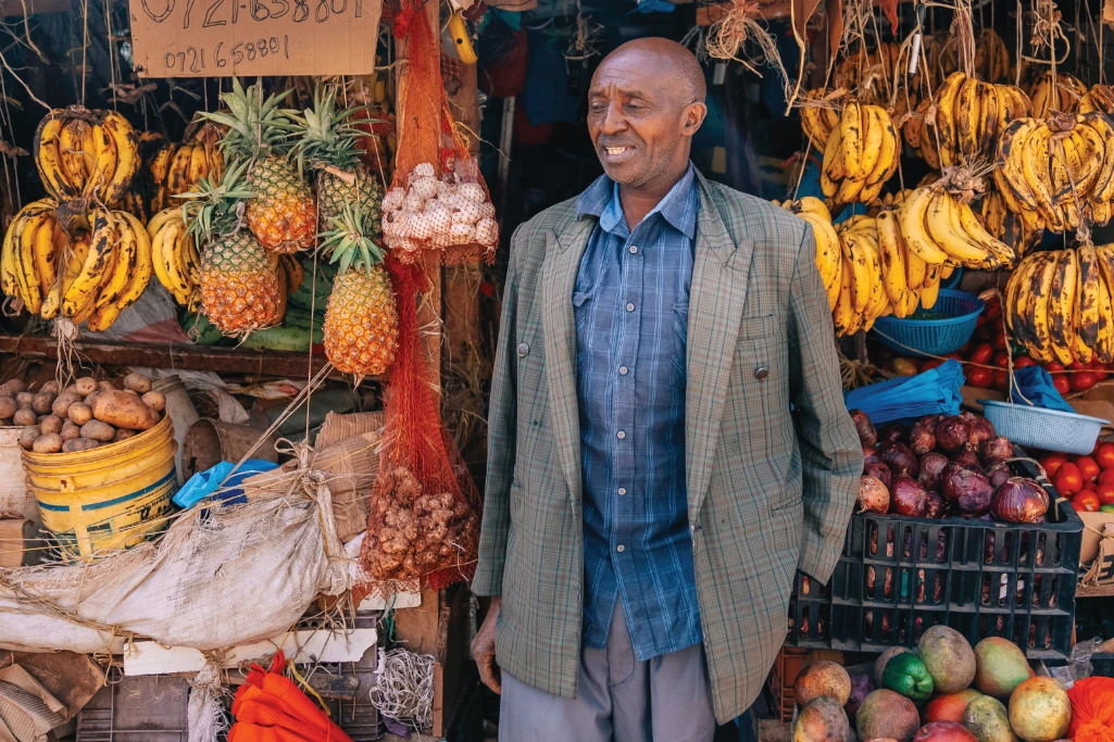 Samuel Kihara at his fresh fruit and vegetable stand